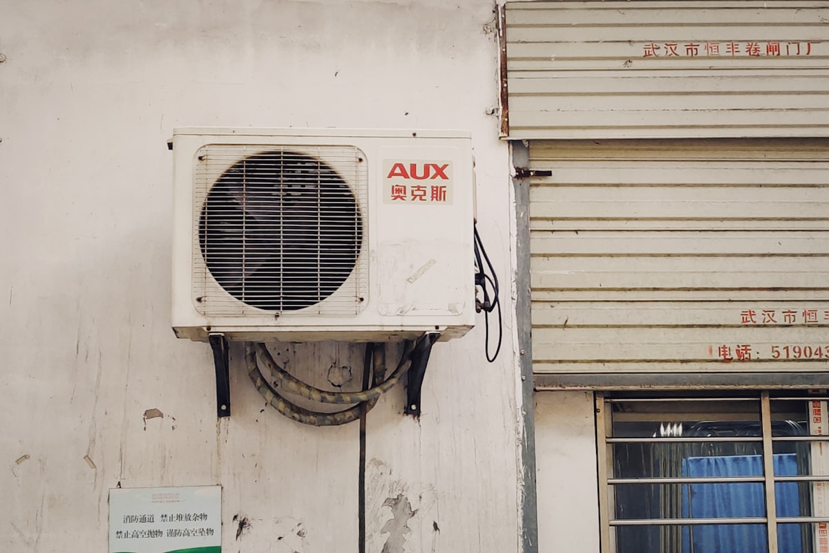 Wall-mounted split air conditioning unit installed in a commercial office